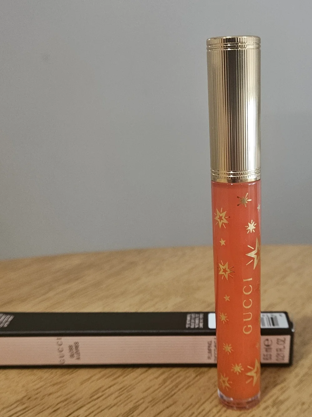 GUCCI  PLUMPING LIP GLOSS IN TERESINA RED